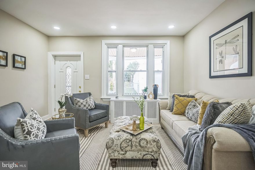 Welcome to this beautifully updated 1,128 sq. ft. row home in the heart of Olney!  This home has been thoughtfully renovated, combining modern amenities with classic comfort. Step inside to an inviting main floor with new laminate wood flooring that flows seamlessly through the living room, dining area, and kitchen. The fully upgraded kitchen is a chef's delight, featuring stylish white shaker cabinets, sleek stainless steel appliances, granite countertops, and a designer island complete with a built-in sink and dishwasher. 

Upstairs, the second floor offers three generously-sized bedrooms, each with plush wall-to-wall carpeting, providing a warm and welcoming space to unwind. The newly renovated full bathroom is fresh and modern, ensuring every inch of this home is ready for its new owner.  Don’t miss the chance to own this turnkey home in a fantastic location!