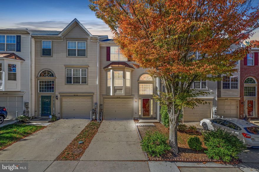 Welcome to 8144 Mallard Shore Drive in the sought-after community of Russett! This gorgeous home is well-maintained and exudes neutral finishes throughout. Walk into the lower level where you are welcomed by a large foyer with plenty of space and hardwoods throughout. There is a large family room (which could also be used as another bedroom or an office) and is appointed with a cozy gas fireplace, entry to the garage, and access to the fully fenced rear yard. The main level is open and offers gleaming hardwood floors throughout. The beautifully updated kitchen boasts an abundance of cabinets, granite counters, ceramic tile floors, a gas range, a separate pantry, access to the large deck, and a laundry area. The large, eat-in kitchen has plenty of space and is perfect for entertaining! The dining room/family room offers an abundance of space and loads of natural light! The family room is open, and airy,  and offers a beautiful bay window. There is also a half bath on this level. Upstairs, the primary bedroom is large and offers vaulted ceilings and a generous walk-in closet. The large primary bath has a large soaking bathtub, dual vanities, and a separate shower! The other two bedrooms are sizable, with an abundance of closet space in each room and a full hall bath. The beautiful hardwoods continue on the upper level as well. In addition to the garage (with built-in wrap-around shelving) and driveway, there is ample street parking as well! This is a must-see! RUN, do NOT walk! This lovely home will NOT last!