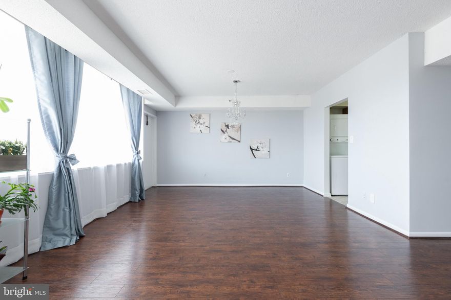 Welcome to beautiful, freshly painted throughout, sun filled home located in the heart of SKYLINE Community!  This Gorgeous 2 Beds 1 full/1half  baths unit  features over 1,200 sq. ft., hardwood flooring throughout,  upgraded kitchen with granite countertops, tile floors and SS appliances. The combination of dining and living area is perfect for entertaining with family and friends.   Step out to a large private balcony with panoramic view and to enjoy sipping coffee while watching the sunrise in this Eastern exposed property.  W&D inside the unit. BOSH HVAC. Marble tile in primary bathroom, plenty of closets.  One garage parking and storage space conveys.   Walking distance to many shopping plazas and many restaurants.   Quick access to I-395.   Minutes to DC, Crystal City,  Pentagon City, Old Town Alexandria and Reagan National Airport. Transportation options include shuttle & metro bus service to Ballston & Pentagon metro stations. NOVA campus  is right behind the building.  An impressive building lobby provides a luxury style living appeal.  It offers plenty of  amenities: concierge, security 24 hrs, 2 exercise rooms, sauna,  outdoor lap pool, party/billiards room, roof top sundeck and picnic area.