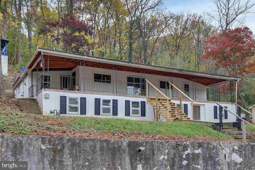 Ranch Style home with a view of the Conewago Creek. Large covered front porch for relaxing summer evenings! Updated gas furnace & hot water heater. Needs work, but nice little investment property or affordable small home. Take a look today!
