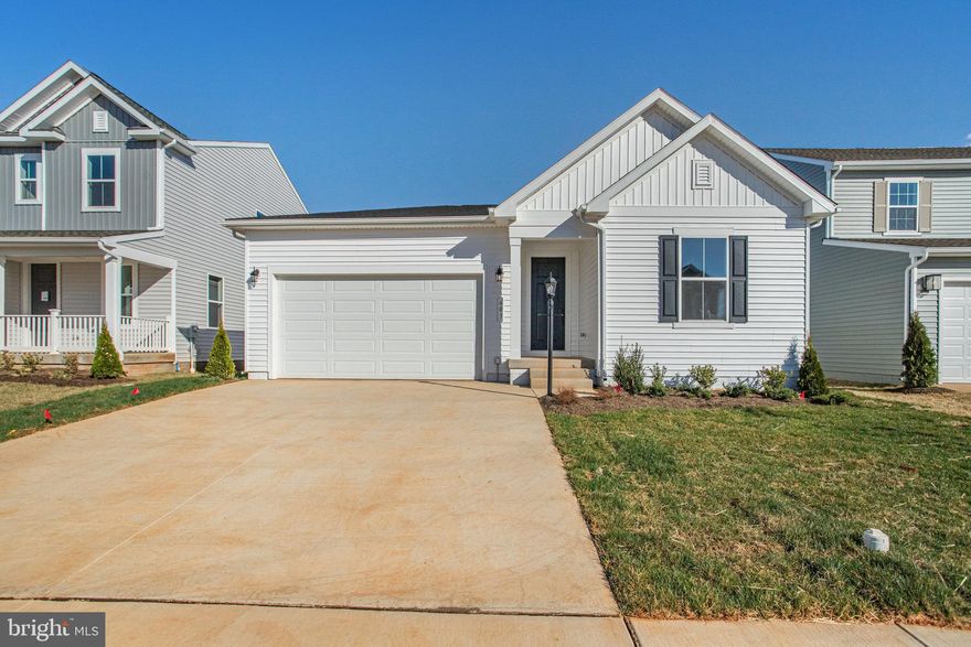 $0 down payment USDA financing eligible! This Alexandrite by Richmond American is move-in ready NOW!! Experience the best of single level living in this Alexandrite plan offering many spacious living areas. A covered entry leads past a laundry into an open floor plan, featuring a kitchen with a center island, a dining area, and a great room complete with center-meet sliding glass doors leading to a large, covered deck. The primary suite is adjacent and includes a walk-in closet and private bathroom. You'll also find a study, two additional bedrooms and a full bath all on the main level. The unfinished basement offers plenty of storage space, with room to grow. This home also includes a 2-car garage! Designer curated finishes round out this home, such as Blanco Maple Quartz countertops, Aristokraft Quill cabinets, 7 inch Bellbrook LVP in the public areas, and sleek matte black light and plumbing fixtures. Welcome to Round Hill Meadows in Orange! Residents will appreciate the small-town charm as well as the conveniences of being close to routes 15, 522 and 3, award-winning wineries, Lake Anna State Park, Lake Orange and the Rapidan River nearby for fishing, swimming, kayaking and boating! Model is OPEN but visitors are encouraged to call ahead to be guaranteed a dedicated appointment.