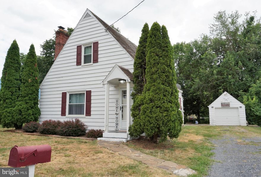 THIS ONE WILL GO QUICK! Affordable charming cape cod featuring  2 beds 1 full bath. Large living room with brick  masonry wood burning fireplace. Hardwood floors throughout the home. Built in corner cabinet- lots of all world charm!  New windows, New front door / storm door. Covered back porch-Detached garage with front entry. Convenient in town location close to 81 & shopping