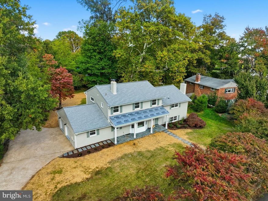 . Welcome to 3409 Sterling Avenue, a one-of-a-kind, fully updated home by Kane Home Design + Renovation in the highly desired Sterling neighborhood of Alexandria. Boasting over 4,200 square feet across five spacious levels, this residence combines modern luxury with timeless charm, offering 5 bedrooms, 3 full baths, and 2 half baths. Step inside to find a light-filled main level with an inviting open layout—perfect for everyday living and entertaining. The living room, anchored by a wood-burning fireplace, flows seamlessly into the dining area and updated eat-in kitchen featuring granite counters, stainless steel appliances, and a stylish backsplash. A powder room and walkout access to the screened porch complete this level. Just a half flight up, the private primary suite occupies its own entire floor—a true retreat with a spa-inspired bathroom including a soaking tub and walk-in shower, a large walk-in closet, and the convenience of an upstairs washer/dryer. On the next level, you’ll find four additional bedrooms and two full bathrooms, providing plenty of space for family or guests. The lower levels are equally impressive. The spacious family room features a second wood-burning fireplace, a wet bar, and a powder room, with direct walkout access to the backyard. The finished basement offers nearly 1,000 square feet of versatile space—perfect for a home gym, playroom, or media lounge—plus a second laundry hookup. Hardwood floors run throughout all levels, with durable tile in the basement. This home is move-in ready with brand-new windows, new siding, fresh paint inside and out, an expanded front porch, and a completely renovated interior. The oversized two-car garage includes an extra storage room for added convenience. All this is tucked away in a quiet, established community while offering unbeatable access to shopping, dining, and commuter routes. You’re just minutes from the Pentagon, Amazon HQ2, Reagan National Airport, and Downtown D.C., with easy connections via Duke Street, I-395, King Street Metro & VRE, and nearby Bradlee Shopping Center. Don’t miss your chance to own this rare luxury home in one of Alexandria’s most sought-after neighborhoods.