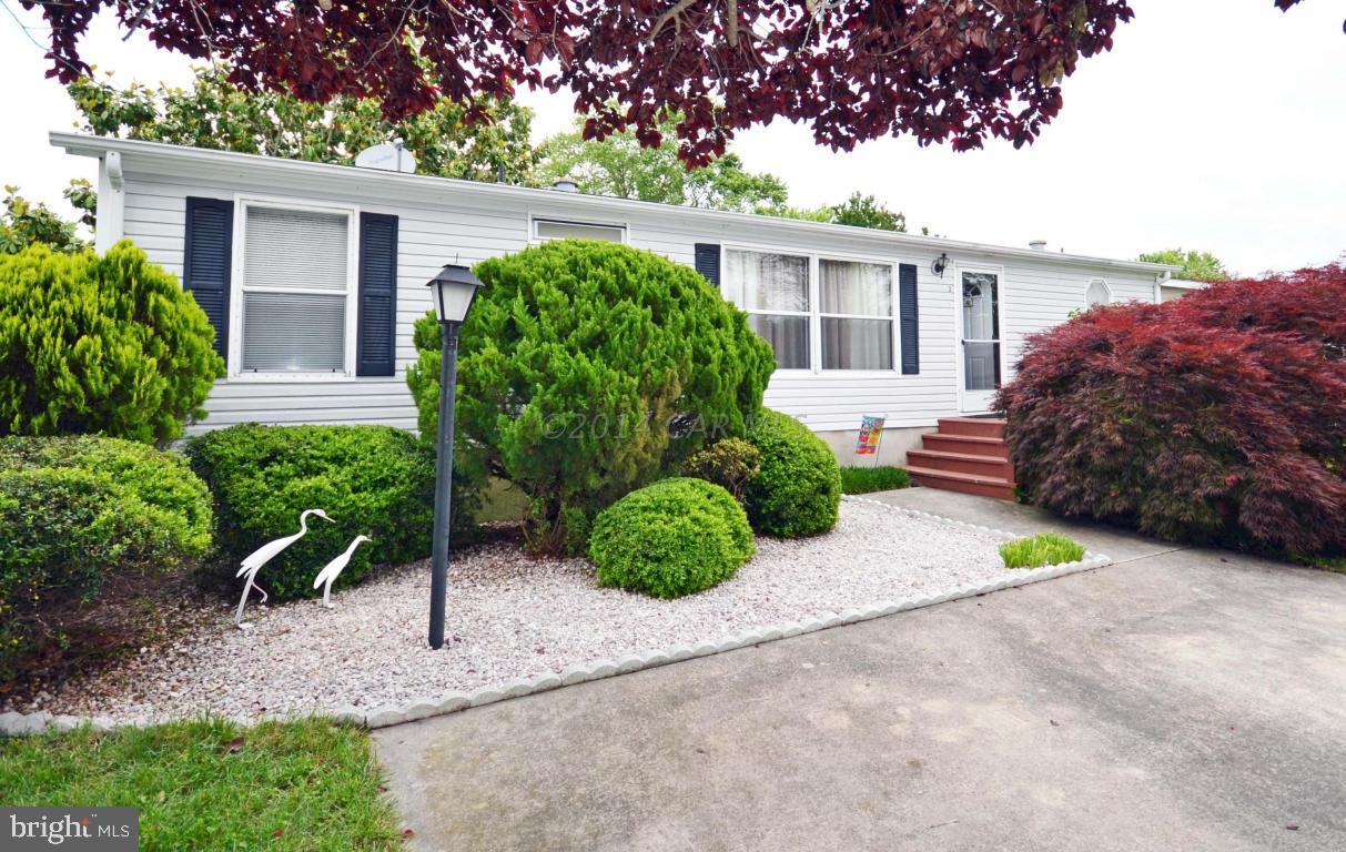 Well maintained 3 bedroom home in Mystic Harbour. Split bedroom, open floor plan. New refrigerator, Washer and Dryer. Beautifully landscaped! Large deck for entertaining, Storage Shed. Mystic Harbour features an outdoor pool, tennis courts, and playground. Lawn care and trash service included in the HOA Fee ($74 Per Month). Just minutes from downtown Ocean City, Assateague Island, Marinas, Restaurants, and Shopping.