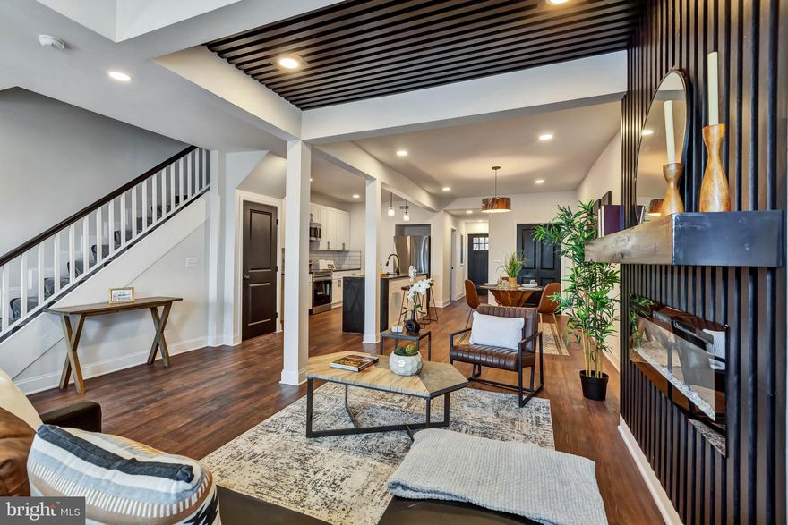 Introducing 3202 Piedmont Avenue—an exceptional architect-designed modern residence crafted with striking style and elevated detail. Created by the same designer behind 3206 Piedmont Ave, this home delivers a rare blend of sophistication, comfort, and bold contemporary architecture. This home also offers four generously sized bedrooms, including a serene primary suite featuring a private balcony, spa-inspired bathroom, and expansive walk-in closet. The heart of the home is an entertainer’s dream—an open-concept kitchen anchored by a dramatic oversized island, seamlessly flowing into bright living spaces filled with modern elegance. Perfectly positioned just steps from the newly revitalized Historic Hanlon Park and only minutes from Downtown Baltimore and nearby metro access, these residences offer refined city living with neighborhood charm. Architecture that captivates. Design that endures. A lifestyle that inspires.