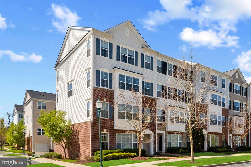 Welcome to 11862 Little Seneca Parkway—an impeccably maintained and updated, end-unit townhouse-style condominium offering over 2,600 square feet of refined living space across three beautifully appointed levels. As the largest model in the Arora Hills community, this rare offering combines the scale and comfort of a single-family home with the ease of low-maintenance condo living. Ideally located in one of Clarksburg’s most sought-after neighborhoods, the home is surrounded by serene walking trails, meticulously landscaped common areas, and belongs to a top-rated school pyramid.

Bathed in natural light from its end-unit positioning, the home’s northeast-facing orientation is perfectly complemented by an abundance of windows along the east side, capturing morning sunlight and allowing natural light to flow through the interiors well into the afternoon—creating an uplifting and inviting atmosphere throughout the day. The home features a spacious, open layout with upgraded hardwood floors on the main and upper levels, new paint throughout, custom blinds, sophisticated lighting, and refinished railings. The main level offers exceptional flow, beginning with a formal dining room that opens to a bright and airy living room—ideal for entertaining, and a private home office just off the living room. The heart of the home is the gourmet kitchen, featuring white cabinetry, granite countertops, a marble tile backsplash, stainless steel appliances, gas cooking, a pantry, and a center island. Just off the kitchen, the inviting family room includes an electric fireplace and access to a private balcony—perfect for morning coffee or evening relaxation.

Upstairs, the spacious primary suite boasts a fully remodeled, spa-inspired bathroom and ample closet space. Two additional bedrooms with brand-new carpeting, a full hallway bath, and a conveniently located upper-level laundry room complete the top floor.

Thoughtful upgrades throughout the home include porcelain tile at both entryways, a Nest smart thermostat and Nest doorbell camera, a MyQ smart garage system with keypad and integrated camera, a new hot water heater, and Level 2 EV-charger readiness. The one-car attached garage and private driveway are complemented by abundant guest parking throughout the community, with no permit required.

Residents of Arora Hills enjoy access to a wealth of amenities, including a clubhouse, outdoor pool, tennis courts, playgrounds, picnic areas, and scenic jogging paths. The monthly association fee includes common area maintenance, exterior building maintenance, lawn care, water, trash and snow removal, and access to the pool, health club, and recreational facilities—providing an effortless, turnkey lifestyle.

This is a rare opportunity to own the largest model in one of Clarksburg’s most vibrant and well-connected communities. Schedule your private tour today!