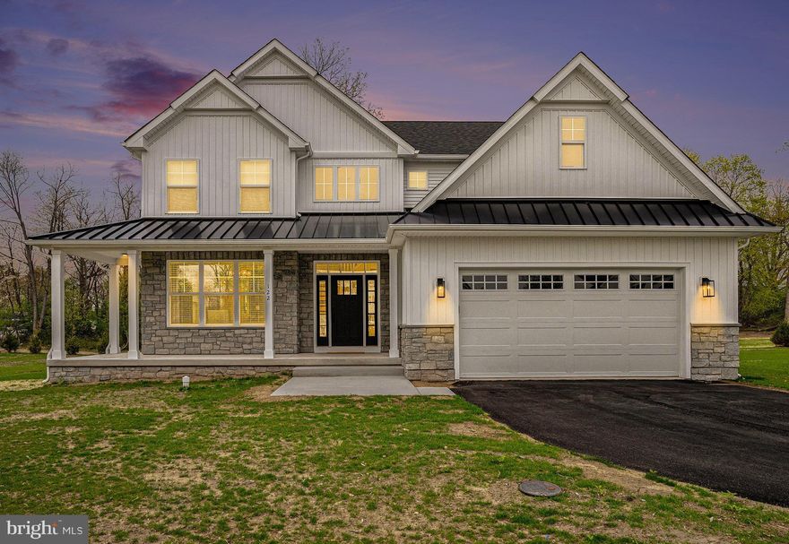 This exquisite, newly constructed custom home offers the perfect blend of timeless elegance and modern luxury, all nestled within the highly desirable Colonial School District. Boasting four generously sized bedrooms and a thoughtfully designed open-concept layout, this one-of-a-kind residence is built to elevate everyday living and effortless entertaining.  From the moment you enter the grand foyer, you’ll notice the attention to detail—from rich shiplap accents to high-end finishes and exceptional craftsmanship throughout. The heart of the home is the gourmet kitchen, featuring a built-in refrigerator, premium GE Café appliances, and a spacious island ideal for gathering. The kitchen flows seamlessly into the expansive living area and out onto a large back porch—perfect for hosting or enjoying quiet evenings. A charming front porch also invites you to relax and enjoy the welcoming neighborhood ambiance. 
Functional elegance continues with a custom-built mudroom complete with stylish cubbies, designed to keep your everyday essentials organized and out of sight. The home also includes a full walk-out basement, offering endless potential for additional living space, a home gym, or recreational area.  With its refined character, airy layout, and luxurious designer touches, this custom masterpiece offers the lifestyle you’ve been dreaming of—and so much more. Perfectly located in Plymouth Meeting, within close proximity to restaurants, recreational outlets, and easy commuting options, such as 476, PA Turnpike, and downtown Philadelphia.  Make your appointment today to view this home.