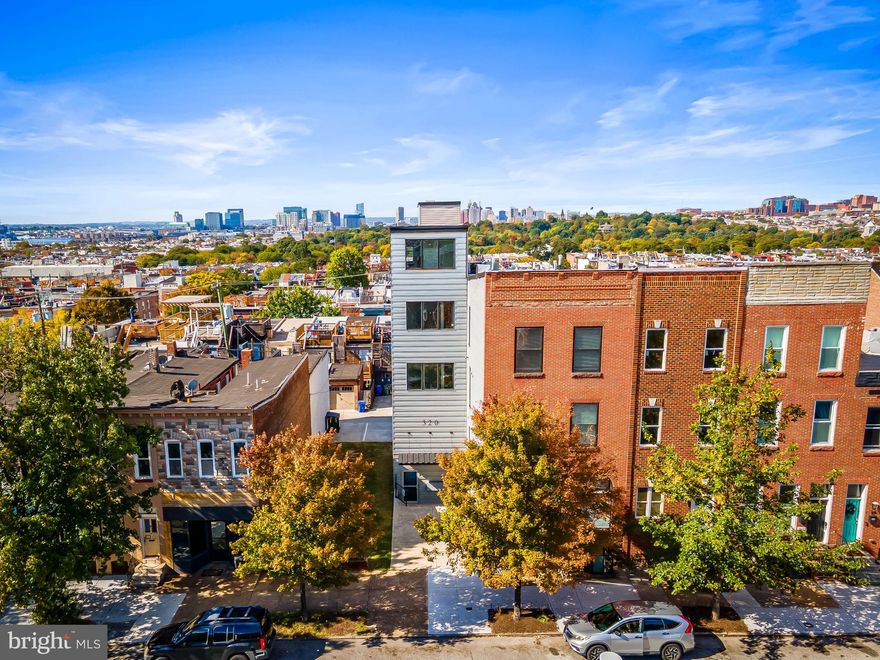 MULTI FAMILY OFFERING IN HIGHLANDTOWN WITH INCERDIBLE VIEWS OF DOWNTOWN & PATTERSON PARK WITH ADDITIONAL DEVELOPMENT OPPORTUNITY - this 4500 sq ft building was completely gutted & renovated in 2016 into 4 apartments.  All apartments are configured as 2 bedroom / 2.5 bathroom with 4 off street parking spaces.  Permitted engineer plans available for an additional 6-8 apartments to be added within a 4-story building on the side yard connecting to the existing lobby.  Some infrastructure improvements already completed in preparation of adding additional apartments such as upgraded water service line, 3 phase electric run down the alley, electric service for 10 units and lobby with elevator shaft already built.  The favorable C-1 zoning allows for the additional apartments to be constructed on oversized 53'x92' lot.  Current gross annual rent over $100k per year with opportunity to more than double income when additional apartments are added.  Agent is owner, call with questions.