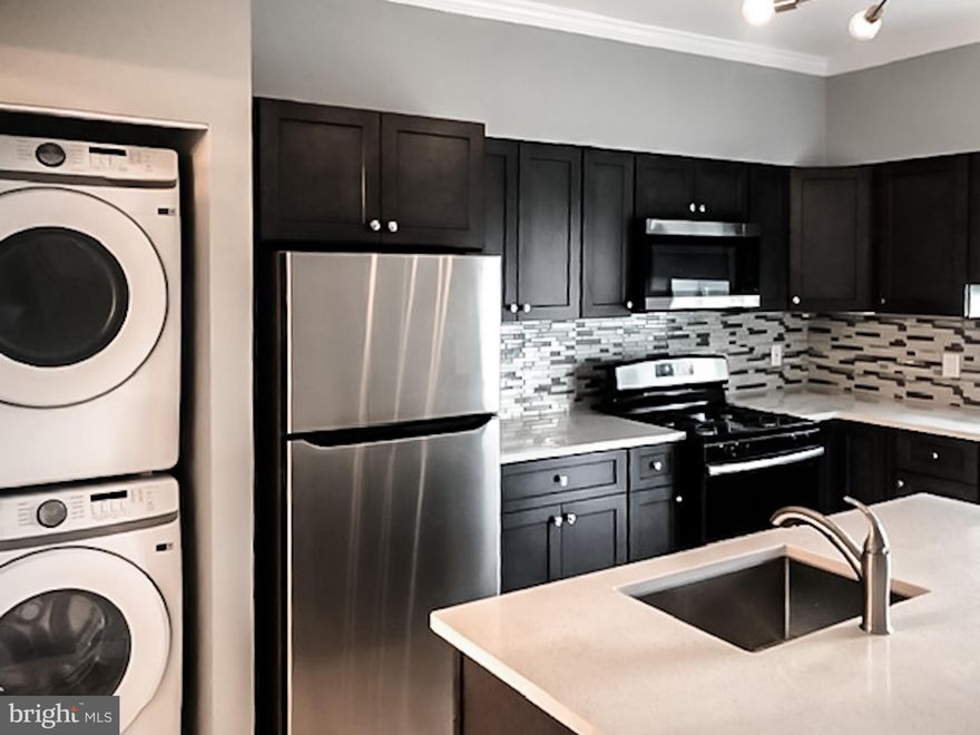 Spacious 4-Bedroom Home with Modern Upgrades and Private Backyard! This beautifully updated 4-bedroom home has it all! Enjoy brand-new appliances, a washer  dryer, dishwasher, garbage disposal, central cooling, and heating for easy living. Step outside to a private fenced-in backyard and a balcony overlooking the green landscape of Harford Elementary School and walking paths. Convenient, comfortable, and move-in ready schedule your tour today!