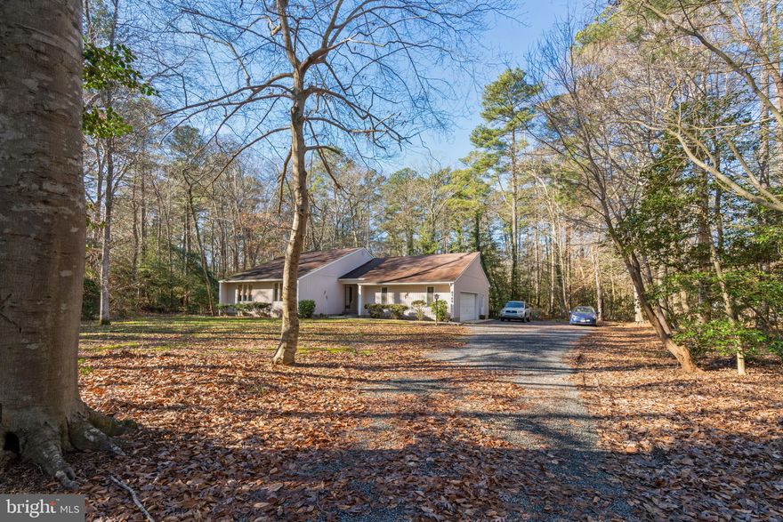 The home in this peaceful forest neighborhood will let you feel like you are in your own secluded world but it is only 45 minutes from the Bay Bridge!  The Kitchen-Dining room and Sunroom have views of the woods and forest visitors.  But if you like a party, this home is set up for it!  The well equipped kitchen has plenty of counter space and cabinet space and two entries to the Living room (via the foyer and the dining area.)  There's even another cooktop in the insulated garage.
