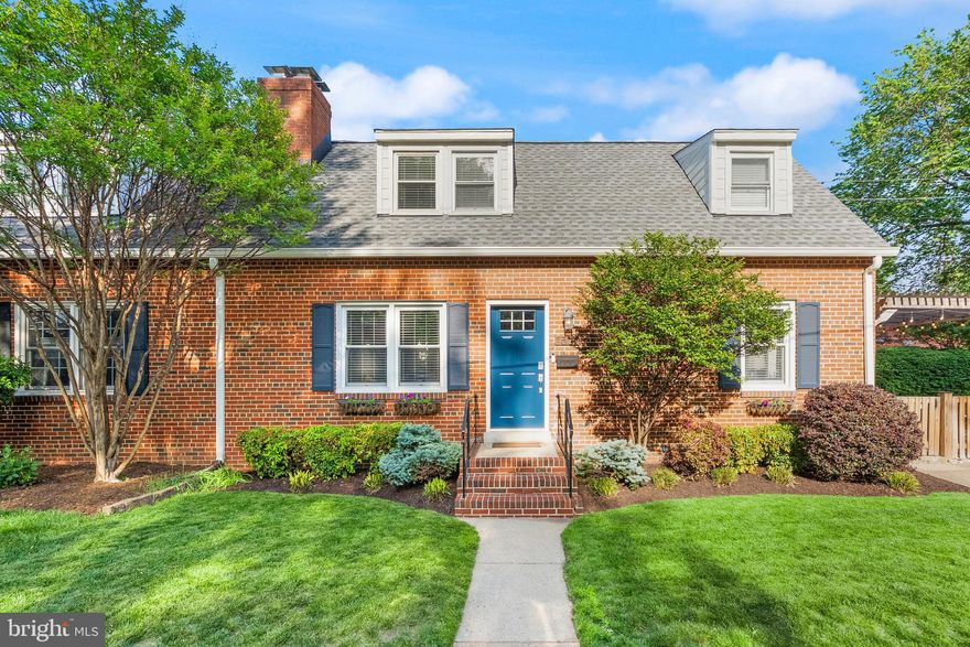 Welcome to this classic brick Cape Cod-style duplex, ideally situated just two blocks from Mount Vernon Avenue, the lively main street of coveted Del Ray. Offering 3 bedrooms and 2 full baths across nearly 1,300 square feet, this charming home effortlessly blends timeless character with today’s updates. Step through the newly installed front door (2024) into a warm and inviting family room featuring rich hardwood floors and a cozy wood-burning fireplace. The eat-in kitchen is bright and airy, showcasing white cabinetry, new light fixtures, and a large window above the sink that fills the space with natural light. Down the hall on the main level, you'll find a versatile third bedroom—perfect for a home office or guest room—complete with a Murphy bed for added flexibility. A classic black-and-white bathroom, along with a conveniently located laundry and storage area, complete the main floor. Upstairs, the hardwood floors continue into two well-appointed bedrooms. The primary bedroom has a walk-in closet, second closet and is large enough to fit a California king bed. The second bedroom serves as a great guest room or a sweet nursery. There is a beautifully renovated bathroom upstairs, too! Thoughtfully redesigned in 2023, this expanded space features a walk-in shower and enhanced storage, perfectly suited for everyday living. The outdoor space at 1501 Wayne Street is made for summer entertaining. Host gatherings under the pergola on the paver patio, grill out while watching the game, and enjoy evenings under the glow of bistro lights. The fully fenced, landscaped corner lot offers ample room for pets and play, plus there’s an off-street parking space equipped with an EV charger. All of this is just under a mile from Braddock Road Metro and moments from the vibrant shops, dining, and local businesses of Del Ray and Old Town. Don’t miss this fantastic opportunity to make this delightful property your next home.