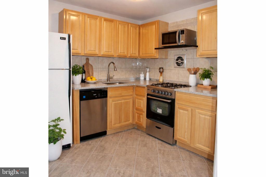 Photo of 5442 Vicaris Street #UNIT 1, PHILADELPHIA, PA 19128 (MLS # PAPH2572594)