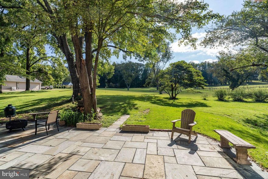 An incredible opportunity to own this premium 3.5 estate-quality acres in the heart of the Potomac Village. The picturesque site, with wide open frontage, sprawling lawns, and mature trees, provides an idyllic, tranquil setting. Build your dream home or refurbish the existing brick house built in 1959. The main level of this charming 4-level split features large living with a fireplace, a separate dining room, a kitchen, and a front-to-to-back sunroom with three walls of windows overlooking gorgeous vistas. Upstairs there are four bedrooms and two full baths. A two-car garage, the fifth bedroom with a door to a patio, and a third full bath are located on the first lower level. The second lower-level features a large family room with a fireplace and a sliding glass door to the backyard, and a large storage area. A lovely front porch and a flagstone patio offering a spectacular view of the sunset sky, complete this charming home. The property is conveniently located in close proximity to the Village center and offers easy access to major commuting routs, three airports, the area's fine shopping, dining, schools, and wide range sports venues, cultural centers, country clubs, and parks. The property is eligible to connect to public water and sewer making it truly exceptional and rare opportunity to build your dream estate!