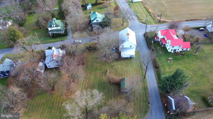 This sale includes two primary structures plus a detached garage on a level 1-acre lot.  Zoning is R-200/NR – Neighborhood Retail overlay allowing for a variety of potential residential and/or commercial uses. Webb’s Store (ca.1897), formerly A&W Grocery, served the community for over 80 years and a Victorian home (ca.1899) located next door on the shared parcel. The property is situated at a four-way stop along a heavily utilized country road that offers plenty of public exposure for your business.The corner store building is approximately 2,750 SFT and consists of a main floor with traditional general store floorplan and includes a restroom and large storage room. The upper level offers a large open space with high ceilings and additional restroom. Located just north along Clarksburg Rd, the included Victorian home is approximately 1,680 SFT and offers 3-bedroom 2 full baths. The metal roof on the home appears to have been replaced in 2008. Shared septic and well. Both structures will require extensive renovation and are being sold strictly as-is. The property is located within the Lewisdale Historic District but is not on the Historic Register. Potential buyers are encouraged to conduct their own due diligence for condition and acceptable use.