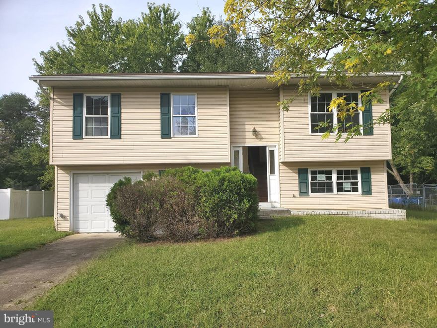 Fantastic Opportunity in Waldorf!  Welcome to this remarkable split foyer home that is brimming with potential and priced to sell! If you're seeking a property with room for customization and personalization, your search ends here. This Waldorf gem is your canvas to transform into the home of your dreams. On the upper level, you'll find a spacious and open living and dining area, bathed in natural light. Additionally, there are three generous bedrooms, each offering comfort and space. A full bathroom on this level adds convenience and functionality to your daily routine. The lower level presents an exciting opportunity for you to exercise your creativity and vision. It's a blank canvas, awaiting your finishing touches to customize it to your heart's desire. Whether you envision a cozy family room, a dedicated home office, or an additional bedroom, the possibilities are endless. This level also includes a second full bathroom, providing added flexibility and convenience. The delightful sunroom addition is a highlight, offering a tranquil space where you can unwind, bask in natural light, and appreciate the changing seasons. Practicality meets convenience with a dedicated laundry area, making household chores a breeze. Plus, you'll have easy access to an attached one-car garage, ensuring your vehicle remains sheltered and protected from the elements. This listing won't last long, so act fast and schedule your viewing today! Don't miss out on this incredible opportunity to create the home you've always envisioned. Contact us now to learn more and take the first step towards making this fantastic deal yours!