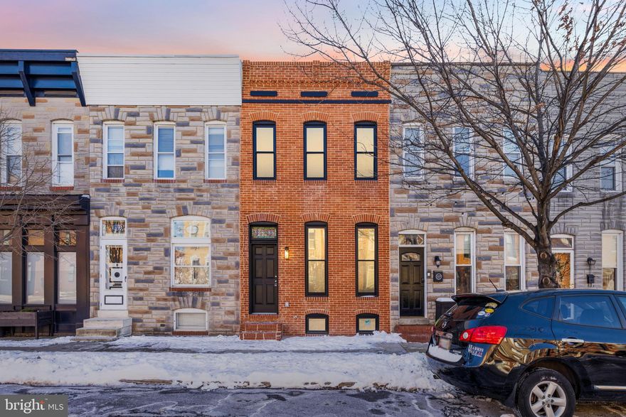 ***CHAP TAX CREDIT PENDING  ***
Welcome to 3217 Fait Ave, a stunning fully renovated home nestled on a charming one-way street in the heart of Baltimore! This modern gem offers 4 spacious bedrooms, including 2 on the upper level and 2 in the finished basement, perfect for a variety of living arrangements. With 3 full bathrooms—2 upstairs and 1 in the basement—convenience and comfort are at the forefront.

The open-concept main floor boasts gleaming hardwood floors, contemporary finishes, and a sleek kitchen with all-new appliances and stylish cabinetry. Step outside to your private parking pad, providing easy off-street parking.

Don't miss the rooftop deck, ideal for soaking in city views and enjoying the fresh air. This home combines modern style, ample space, and an unbeatable location. Schedule your tour today and make this dream home yours!