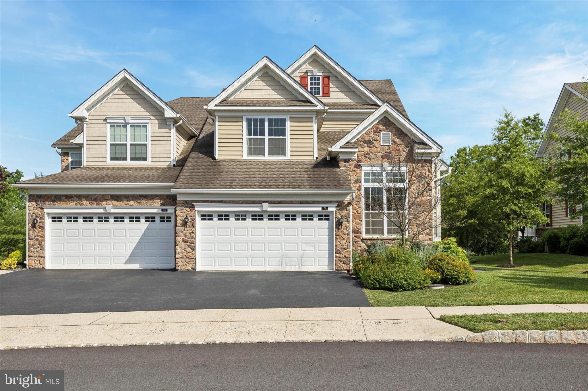 Welcome to this fabulous end unit in the sought after White Springs at Providence development - no age restrictions. This unit offers exceptional curb appeal. Walking up to the home you will see the beautifully landscaped flower beds. Enter into the two story foyer and it is easy to see that the owners have lovingly upgraded this home throughout. To your left is the formal living room with vaulted ceiling. To your right is the two story formal dining room. There is also upgraded custom lighting from Hubbard Forge throughout the home. Additionally there is upgraded hardwood throughout the first floor. The dining room leads to the gourmet kitchen complete with upgraded appliances, upgraded hood, island, pantry, granite and upgraded pendant lighting. The kitchen opens to the exquisite family room boasting a cathedral ceiling and upgraded vented gas fireplace. The primary bedroom suite was expanded an additional 4 feet off the back and offers a huge walk-in closet and stunning primary bathroom with upgraded tile and double vanity. A main floor laundry, powder room and garage complete the main floor. Climb the elegant grand staircase with upgraded open railing and you will find a spacious loft ideal as an in-home office or additional entertaining area. There are two additional large bedrooms and a hall Bath on this floor. There is an expansive basement with a home theatre and an additional area ready for your finishing or to be used as storage. The upgraded deck with an oversized, 2-level composite deck that serenely backs to the woods - an ideal retreat after a long day! This home is ideally located just behind the Providence Town Center, and provides easy access to shopping, dining, 422 and so much more! The White Spring Community offers many amenities including Clubhouse, Pool, Fitness Center, Shuffleboard, Walking Trails, Tot Lots, and more. All this and Spring-Ford Schools. This home is more than just a house, it is a great lifestyle.