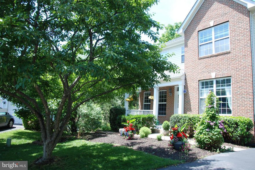What a fantastic location --- just minutes to historic Downtown Manassas with restaurants, unique shops, farmer's markets and so much more.  Come home to a wonderful three level brick front colonial nestled on a quiet cul-de-cac with mature trees and beautiful, colorful plantings.  Four bedrooms, three and half bathrooms, laundry on the bedroom level.  Family room has  gas fireplace open to a large kitchen, formal living room and dining room, hardwood floors, 2 car garage, finished walkout basement with possible 4th bedroom, workroom and full bath. Fantastic deck overlooking patio and pond, BIG backyard, and much more. HVAC and water heater new in 2021, Roof is 3 years old.
