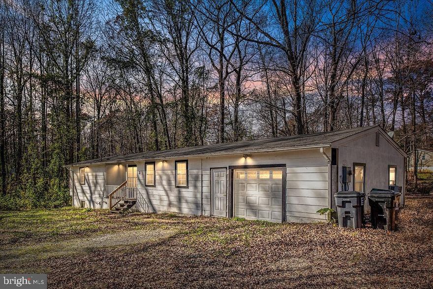 Lovely well maintained home on over a half acre in secluded lake community.  This charming rambler boasts four generously sized bedrooms and two full bathrooms.  Freshly painted throughout!  Recently updated flooring featuring luxurious laminate in the family areas and plush new carpeting in the bedrooms.  Master bedroom with a unique picturesque window wall to enjoy the scenic views of trees all around.  Walkout finished basement offering plenty of storage/ work space and laundry area with newer Samsung high efficiency washer and dryer.  Huge oversized garage for all the handy tool guys out there! Enormous shed in the backyard for ample storage.  No HOA, to live as you wish! Zoned for highly rated Mountain View High School! Priced well below the median sale price for a single family home in Stafford!  Come see this one now!  It will not last long!