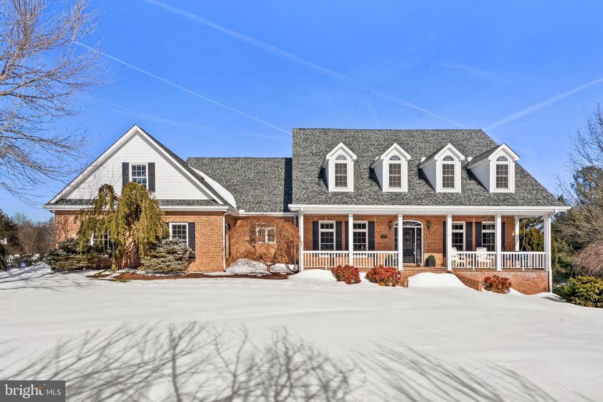 There are homes that offer space… and then there are homes that offer possibility. This custom-built brick estate in the highly desirable Cliffside subdivision delivers both, set on 1.75 acres with over 7,500 finished square feet across three beautifully designed levels.<br>
From the moment you circle into the driveway, the presence feels intentional. Classic brick, dormer windows, and a welcoming front porch create timeless curb appeal. It’s elegant without being showy, the kind of home that feels established, confident, and quietly impressive.<br><br>
Inside, the scale unfolds naturally. The great room is anchored by custom built-ins and a gas fireplace, striking the perfect balance between architectural detail and everyday comfort. Just beyond, a long sunroom stretches across the rear of the home, wrapped in windows that flood the space with natural light. It’s easy to imagine slow mornings here, coffee in hand as the seasons shift outside.<br>
The kitchen offers generous prep space, extensive cabinetry, and seamless flow into gathering areas, ready for everything from casual dinners to larger celebrations. Warm flooring carries throughout the main living spaces, grounding the home in a rich, welcoming tone.<br><br>
The primary suite feels like its own retreat. A fireplace adds warmth, multiple closets provide true functionality, and the spa-like bath with dual vanities, soaking tub, and separate shower creates a space designed for restoration rather than routine.<br>
Upstairs, three additional bedrooms and two full baths offer flexibility and thoughtful separation. Two bedrooms sit at opposite ends of an Upper Level Bonus / Flex Space featuring a built-in study area, ideal for homework or a quiet workspace. The layout adapts easily to changing needs.<br><br>
One of the home’s most compelling features is the fully self-contained 929-square-foot apartment on the main level. This is a private residence within the home. With its own entrance, full kitchen, spacious living room with fireplace, large bedroom and full bath. it functions as a true independent residence. Appliances were updated in 2022 and 2024, enhancing efficiency and convenience. Whether used for extended stays, long-term guests, a private office arrangement, or multigenerational living, this space offers rare autonomy while remaining seamlessly connected to the main home.<br><br>
The finished walkout lower level expands the possibilities even further, featuring a large recreation room, full bath, and generous storage. Movie nights, hobbies, fitness equipment, or game tables all fit comfortably here.<br>
Behind the scenes, the home is engineered for peace of mind. Two gas HVAC systems installed in 2018, two tankless water heaters installed in 2014, a water softener, and a whole-house generator provide year-round efficiency and reliability. Every major system reflects thoughtful planning and long-term confidence.<br><br>
Beyond the property itself, Cliffside residents enjoy exclusive access to a private 13-acre park with approximately three-quarters of a mile of Shenandoah River frontage. Afternoons fishing. Picnics under open sky. Quiet moments beside the water. It’s a rare amenity that elevates daily living in a way few neighborhoods can offer.
All of this is just minutes from the charm of Edinburg, including local dining, historic character, and access to the outdoor recreation the Shenandoah Valley is known for.
This isn’t simply a large home. It’s layered and flexible, designed to evolve as life does.
The real question isn’t whether it has enough space.
It’s whether you’re ready for a home that finally does.