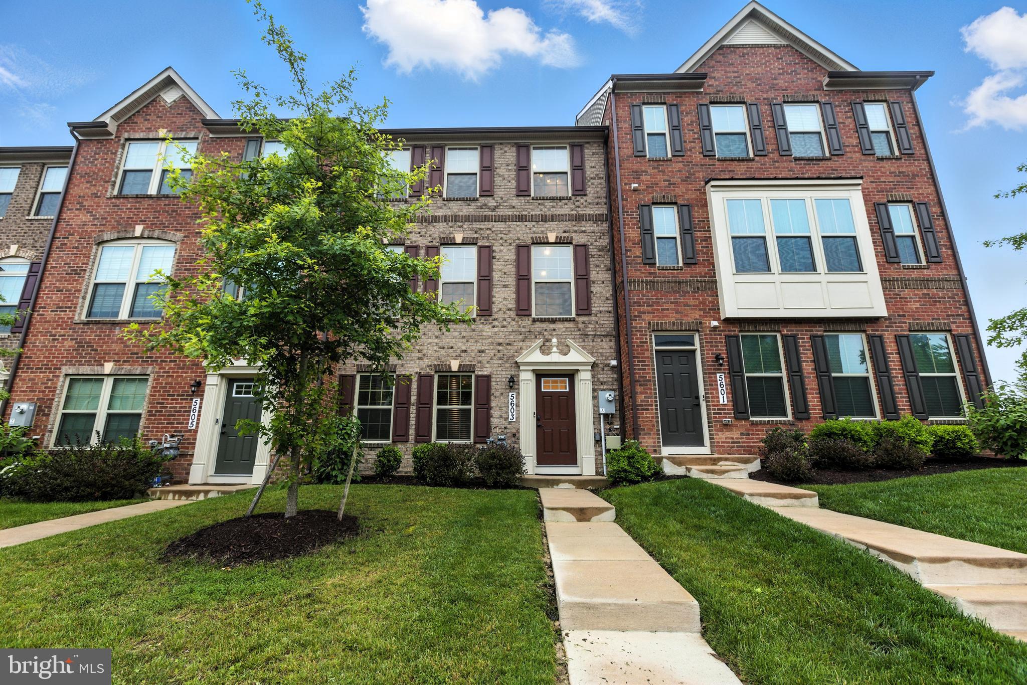 This stunning three-level townhome seamlessly blends comfort with contemporary style. The heart of the home showcases a gourmet kitchen equipped with sleek cabinetry, designer lighting fixtures, and an expansive island that serves as the focal point for both meal preparation and casual dining. This culinary space seamlessly transitions into the adjacent living areas, creating an inviting atmosphere that is perfect for both relaxation and entertaining friends.
The main floor includes a well-appointed half bath and opens to a generous outdoor deck through sliding glass doors, extending your living space into the fresh air.
The upper level features a luxurious master bedroom with its private bathroom sanctuary, complemented by two additional well-proportioned bedrooms that share an elegantly appointed bathroom.
The lower level transforms into your haven, whether you envision a cozy family room, a productive workspace, or comfortable guest quarters. This versatile space connects to the attached two-car garage.
This exceptional property offers turnkey living with every detail thoughtfully considered for your immediate enjoyment.