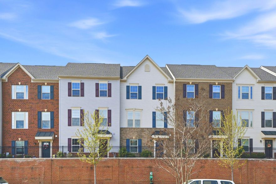 Welcome to this beautifully upgraded, newly built townhouse offering modern design, flexible living space, and incredible convenience! As you enter, you’re greeted by a versatile lower level featuring a den, rec room, and dedicated workout space, perfect for today’s lifestyle. This level also includes a powder room, utility closet, and access to the one-car garage. The main living level is bright, open, and designed for both everyday living and entertaining. The spacious kitchen is a standout, boasting abundant cabinetry, granite countertops, tile backsplash, stainless steel appliances, and plenty of prep space. Enjoy casual meals at the oversized island or host dinners in the eat in space. There’s even room for a coffee bar and additional storage to keep everything organized. The adjoining living room features an eye-catching accent wall, crown molding, and engineered hardwood flooring, creating a warm and inviting space to gather. Upstairs, retreat to the luxurious primary suite complete with a tray ceiling, accent wall, and durable LVP flooring. The ensuite bath offers dual vanities and a sleek walk-in glass shower. Two additional bedrooms and a full bath with a tub/shower combo provide plenty of space for family or guests, while the conveniently located laundry makes everyday living a breeze. Step outside to the composite deck off the kitchen, perfect for entertaining or enjoying your morning coffee. Parking is effortless with a one-car garage and two-car driveway. Enjoy community amenities including a pool, clubhouse, playground, and open green space. Ideally located near White Marsh Blvd, White Marsh Mall, I-95, I-695, Route 40, and countless shops and restaurants, this home truly has it all!