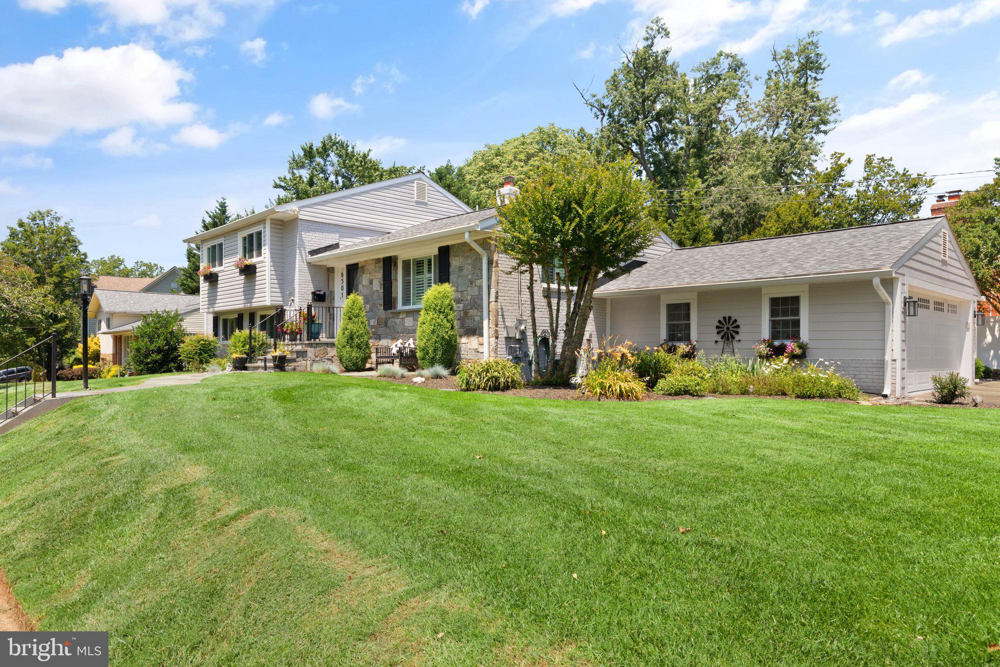 Beautifully Upgraded Home Offering Comfort, Style, and Exceptional Value. This thoughtfully enhanced home features a stunning kitchen with white soft-close cabinets, quartz countertops/backsplash, and a large center island—perfect for both everyday use and entertaining. Gleaming hardwood floors flow throughout, and all bathrooms have been tastefully updated with quality finishes. The backyard is a true highlight, designed for relaxation and entertaining with a flagstone patio, pergola with new sunshade covering, wood-burning stone pizza oven, and a handsome stone fireplace. A recently added oversized garage provides room for two large trucks and includes a professionally finished floor coating with a lifetime transferrable warranty. Additional updates include the HVAC system, LED recessed lighting throughout, front windows, large shed and more. Truly a move-in ready home.
