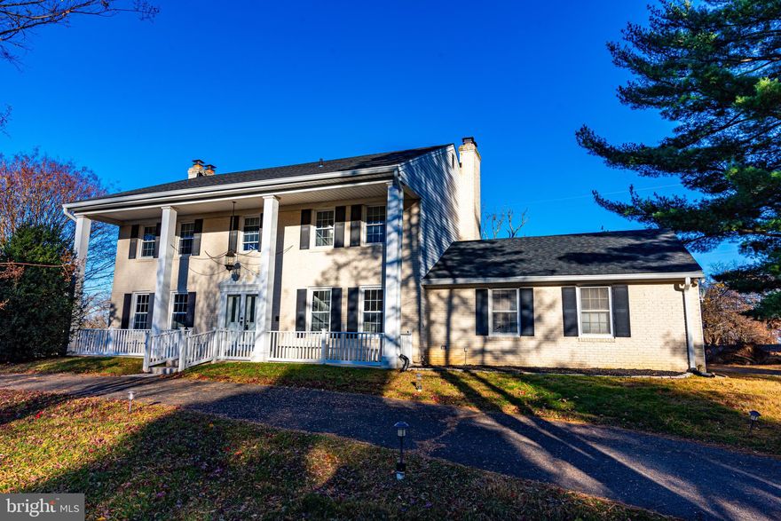 Welcome to highly sought after Ashton, Maryland, where this stunning custom built Colonial style 3784 sq. ft. home awaits you. You will love the large open front porch. 
Prepare to be impressed by the stunning brand new kitchen renovation that showcases new cabinets, wall oven, stainless steel appliances, and beautiful granite countertops. Whether you're hosting a dinner party or enjoying a casual meal with loved ones, this kitchen is a chef's delight. The eat-in kitchen adjoins the formal dining room and offers picturesque views of nature. Cozy up on chilly evenings next to one of the two wood fireplaces that exude warmth and character. Step inside and be greeted by the grandeur of large bedrooms, including a luxurious primary bedroom complete with walk-in closets and a cozy sitting area. The recently remodeled bathrooms boast brand new fixtures and ceramic tile floors, while the primary bathroom features a rejuvenating bathtub for ultimate relaxation. The finished basement, complete with a full bathroom, provides additional living space for entertainment or relaxation.  Sitting on two acres of land, this property offers ample outdoor space for all your needs. Whether you envision creating an oasis for relaxation or cultivating your own garden sanctuary, the possibilities are endless. The large, partially fenced back yard has easy access to hiking and horse trails and the Little Patuxent River. (horses are allowed).  The paved circular driveway makes it easy to turn around and includes a side entrance two car garage. There is no HOA. Convenient to both Baltimore and DC, this property offers both tranquility and convenience. Don't miss the opportunity to call this remarkable Ashton home your own.