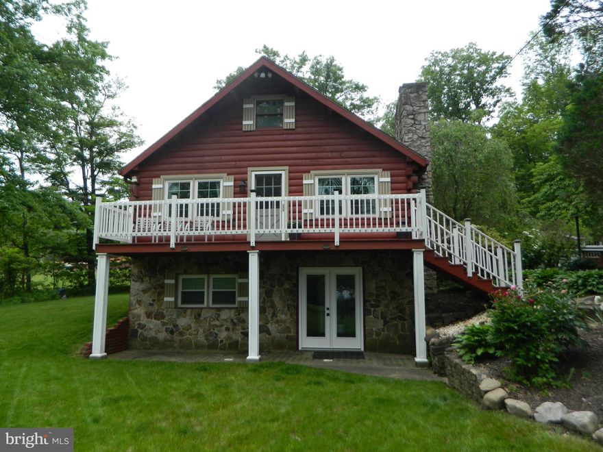 Welcome to peace and tranquility! This adorable cabin style home offers the best of both worlds as it is close to downtown Lock Haven but tucked into the quiet scenery of Ivy Lane.  On almost an acre of land and backing up to pasture, you'll enjoy the privacy of your backyard without being too far from the action! Inside you can entertain in the large, updated kitchen open to the living room, perfect for entertaining!  Enjoy the mix of rustic cabin life with some nice updates as you sit in the inviting living room with fireplace.  The main level is finished off with a full bathroom and a bedroom.  The upper level is ideal for a bedroom loft or office while the mostly finished walkout basement can be a bedroom, hobby room, or anything else your heart desires!  A large three season room will make fall evenings and Spring mornings something to cherish and looks out over a huge stone patio butted up to pastureland.  Whether you're looking for rural cabin life, a weekend get-away, or a home near shopping, but without the busy feel, this is the home for you!  If you have an EV, this home has a 220 ready to go! Call right away for a showing today!