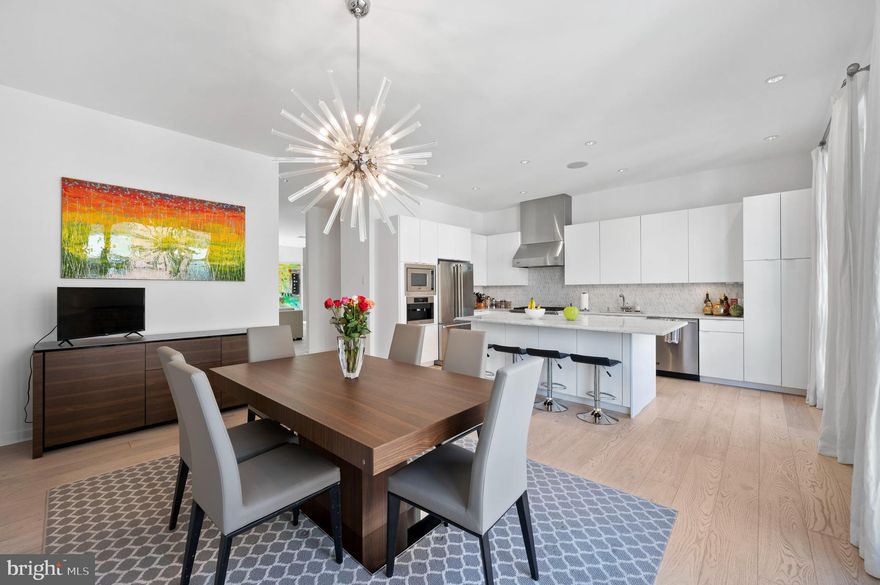 Welcome to 1430 Kater Street, an EXTRA wide (24 feet) spectacular home in a gated community, just a short walk to Rittenhouse Square and in the highly desirable Greenfield School Catchment! Features include amazing natural light, an oversized 2-CAR GARAGE accessed through a covered gated driveway, custom designed closets galore, and many high-end designer finishes throughout.
Enter into a wide "suburban-like" ceramic tile foyer and store your things in a custom designed walk-in coat closet. On this level you have a large bedroom (or office) and a full bathroom. 
Up one floor to your main living area, which includes an enormous gourmet kitchen (Viking and built in Miele espresso maker) with a large island and oversized dining room that could fit a table for 10! Your sizable and stunning living room looks out onto the first of three decks, perfect for outdoor entertaining! Brand new gorgeous tile fireplace, 1/2 bath, and pantry complete this level.
The 3rd level includes 3 more bedrooms and 2 full baths. Spacious primary suite includes a large new custom walk-in closet as well as a second closet, and ensuite bath. This level has two more bedrooms with custom finished closets, a hall bath, and upstairs laundry.
Finally you'll find a large pilot house complete with a wet bar, large walk in closet and enough room for a small sitting room or office. Two magnificent roof decks on either side of the pilot house offer fantastic panoramic views of Center City.
Basement is fully finished; newly carpeted with another large closet and other built-in's.
The sellers completed many high end renovations in 2020, including brand new flooring, designer wallpaper, a new roof, a master closet expansion and re-designed bathrooms with high end finishes.
Move-in ready on a quiet street in a highly desirable neighborhood!
Close to transportation, excellent restaurants, Avenue of the Arts, shopping and Rittenhouse Square. Schedule your showing today!