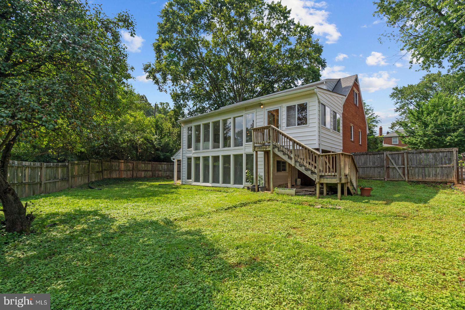 **Deceptively large Cape Cod in the Cardinal, Swanson, Washington-Liberty school pyramid provides nearly 3,000 square feet of space on a rare 10,605 square foot lot**Home is freshly painted along with these recent updates: 2020: kitchen refrigerator with icemaker**2021: remodeled basement with new kitchen, bathroom, flooring, and lighting**gas water heater**main level bathroom, stacked washer and dryer on main level**lower level dryer**2023: outside air conditioning compressor**2024: chimney caps and main level dishwasher replaced**
**Desirable details: wood burning fireplace in living room, wood cabinets, solid surface countertops and stainless appliances in kitchen; breakfast bar divides kitchen from family room and sunroom; stairs from sunroom to level, fenced rear yard; washer and dryer on main and lower levels; original wood floors on two levels; flexible lower level with light filled sunroom opening to yard.
**Easy access to bike and walking path to Ballston for Metro, restaurants, shops, services, and nightlife**Stroll to Lacey Woods Park with playground, sports courts, soccer field and acres of shaded paths**Near Westover Village's library, restaurants, shops, services, and Sunday Farmer's market**
**This well-loved home awaits the buyer who values space, convenience and location**