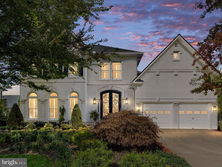 Enjoy main-level living in this timelessly elegant Renaissance Villa, tucked inside the prestigious gates of River Creek—Leesburg’s resort-style gem where the Potomac River meets Goose Creek. Show-stopping wrought-iron double doors set the tone for elegance from the moment you arrive. Inside, a floor plan inspired by classic European villas centers on a dramatic two-story living room, where floor-to-ceiling windows bathe the space with natural light and frame tranquil courtyard views. To one side, the private primary suite opens to the flagstone patio, creating a serene connection between indoors and out. To the other, an exquisite custom-designed kitchen (with quartzite countertops, a spacious center island, tile backsplash, hood, and top-of-the-line appliances) flows seamlessly into the inviting great room, where a cozy gas fireplace sets the tone for relaxed luxury. A formal dining room offers a warm setting for special occasions, while the stately home office with built-ins makes working from home effortless. The primary suite is a peaceful retreat, featuring two custom walk-in closets and a spa-like bath with dual vanities, a soaking tub, and a frameless glass shower. Step outside to a leafy private sanctuary, where birdsong, gentle breezes, and the soft trickle of a fountain create an atmosphere of calm and connection to nature. A sweeping staircase leads to an open loft, off of which, a secondary ensuite, two additional bedrooms, and another full bath offers comfort and privacy for family or guests. The lower level is designed for both entertaining and relaxation, complete with a wet bar, recreation room, and sophisticated living area, plus two dens, full bath, and generous storage. This is more than a home—it’s a statement. A turnkey masterpiece that blends architectural grace with modern comfort, set within one of Northern Virginia’s most sought-after gated communities. River Creek offers resort-style living on over 600 acres, where over half the land is preserved as scenic open space. Residents enjoy golf, tennis, pickleball, swimming pools, fitness facilities, playgrounds, walking trails, kayak launches, and a vibrant clubhouse with dining and social events—all just minutes from Wegmans, Whole Foods, Trader Joe’s, and the charm of historic Leesburg. 
Welcome home to River Creek— a gated community where luxury living meets everyday ease. Overlooking the Potomac River & Goose Creek , over half of the 600+ acres is scenic open space. The 18-hole Ault-Clark championship golf course offers various levels of membership. Dining options are either inside the clubhouse or on the patio overlooking the Potomac River. A lively social calendar with seasonal events, plus a host of activities and clubs allows residents to feel a sense of community right at home. The community offers an active lifestyle, with lighted tennis & pickleball courts, swimming pools, fitness center, and 7 miles of paved jog/walk trails meandering through the community. There are basketball courts, playgrounds, a kayak / canoe launch, and sand volleyball. What more could you ask for? River Creek has it all!
Information is compiled from sources deemed reliable but is subject to errors and omissions.