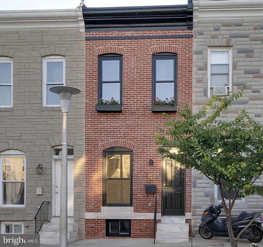 For rent in Patterson Park! This 2-bedroom, 3-bathroom row home boasts an optional third bedroom in the basement. Featuring custom metal railings, exposed brick, high-end cabinetry, stainless steel counters and appliances, reclaimed wood shelving, a master suite, 10-foot ceilings, reclaimed hardwood floors throughout, crown molding, and so much more. Don't miss the two story rear deck and charming rear patio! **This rental is available furnished, as well! Please inquire with co-listing agent Angela Glorioso for more information on pricing, furnishings, etc.**