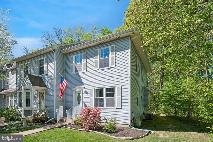 Introducing 48 Andrews Ct, a nice 3 bedroom 2.5 bathroom end-unit in the desirable Canterbury Woods neighborhood.   As you enter the home you will immediately notice the beautiful floors throughout the 1st floor and how large the living room is.  Its the perfect size to fit all of your furniture.   The kitchen features a tile backsplash, stainless steel appliances, solid surface countertops, a hood vent,  and an island.  This opens right up to the dining area with sliders that lead to a big deck overlooking the rear yard.  There is also a very convenient powder room on the 1st floor.   On the 2nd floor you will find 2 bedrooms with ceiling fans and ample closet space, hallway laundry, and 2 updated bathrooms.   One of the bedrooms has its very own bathroom in it.  The 3rd floor loft area makes for a great 3rd bedroom, an office, or a workout room.  The finished basement is very nice and offers a gas fireplace, another great family room area, and plenty of storage.  The property has a nice front, side, and rear yard.   Newer hot water heater (2024).   It also has two dedicated parking spots and plenty of parking for guests.   Easy access to shopping centers,  major access routes,  tax-free shopping in Delaware and just 20 minutes to the Philadelphia International Airport.  The HOA covers the lawn, mulching, trash, and snow removal so you can kick back, relax, and enjoy living!