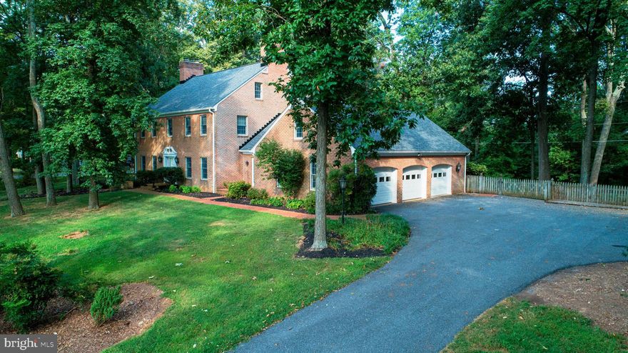 ENJOY THE VIEW from this outstanding Brick Colonial, 4 Bedrooms, 4 1/2 Baths, with a spacious home office that could be used for a 5th bedroom. Situated on 1.3 acres, beautifully landscaped and conveniently located in historic Westminster.  Private, fenced rear yard offers extensive hardscaping with patio, inground, heated salt water pool and hot tub. Gather around the firepit to enjoy fall outdoors, and when you're ready to go inside, there's plenty of room for everyone. The main level offers a family room, living room, dining room, kitchen and half bath. The family room with wood stove insert is a great place to watch your favorite TV shows and cozy up to the wood stove insert.  The formal living room offers amazing space,(37 x 16), a wood burning fireplace, French doors to patio and beautiful hardwood floors.  The main level kitchen  is centrally located and offers a breakfast island and table space for convenient dining.  Need  a break from it all? The large master bedroom with a sitting area, fireplace & en suite bath is the perfect retreat. Second bedroom, spacious home office, a study, or additional office space & hall bath are all on the second level. Two more bedrooms and a full bath are on the third level.  Ready for some fun or entertaining? The finished basement provides a rec room with pool table, theater room and gas fireplace.  A kitchenette, hobby or exercise room, full bath & abundance of storage are in the lower level too.  This home has been lovingly maintained, improved & upgraded with too many amenities to mention.  Special Financing Available for Eligible Veterans and those serving in Military.  Call today for your personal tour.