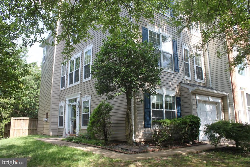 Nicely Updated Townhouse, located in the sought-after Broadlands Community. Hardwood flooring throughout main level, Kitchen/w island, large family room, spacious deck, fenced-in yard, 1 car garage, over 2500+ Sq ft, Bright and open, spacious bedrooms, His and her closet in master bedroom, masterbath w/jacuzzi, huge Rec room w/fire place and walk out to rear fenced yard, office, end unit with ample light, three level extension.