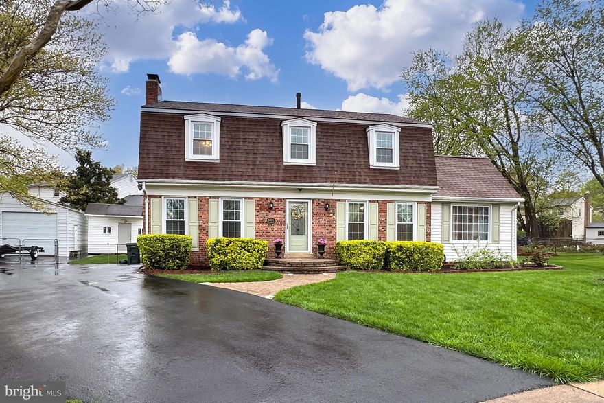 Looking for an absolutely turn key home in a fabulous community, with tons of space to grow and in a sought- after location?  Look no further!  Situated in a small, private cul-de-sac, this three level Colonial offers over 3,000 square feet of finished living space, with five legal bedrooms, plus bonus room, and four full baths.  With an oversized driveway and a detached two car garage, coupled with an abundance of both interior and exterior space, this is a home for comfort and entertaining!   Front entry foyer transitions seamlessly to the generous formal dining room and expansive living room, with expanded and magnificently updated gourmet kitchen,  boasting stainless appliances, quartz countertops, decorative tiled backsplash, convenient breakfast bar and high-end cabinetry.  As an extra bonus, no more carrying heavy pots of water to the stove, with the handy pot filler to make life easy.    Main level bedroom and beautifully updated full bath provides ideal space for in-law, overnight guests or au-pair.   The inviting family room, enhanced with custom built-ins, offers additional space for hosting family celebrations or large gatherings.  Step outdoors from the kitchen to the exceptional back yard space, featuring a bricked patio with built-in grilling station and room to enjoy games of flag football, gardening and family fun.   The upper level boasts a large, sun filled primary suite complete with spa-inspired luxury bath and walk-in closet.  Three additional upper bedrooms and updated full bath offer ample room for growing families and work from home space.  Oversized attic provides substantial room for all of your storage needs and is easily accessed without the use of a ladder!  The recently updated walk-up lower level offers multi-functional use with the generous recreation room, wet bar, bonus room and 4th updated bath.  Additional storage opportunities plus convenient laundry room complete the picture of roominess.  Major recent improvements include new roof, windows and doors, dual HVAC systems, interior/exterior paint and much more.  All bathrooms and gourmet kitchen have been magnificently updated and/or renovated in recent years.  With proximity to Ft. Belvoir, Kingstowne, Metro, major roadways, shopping and walk to school(s) convenience, make this special home yours today!