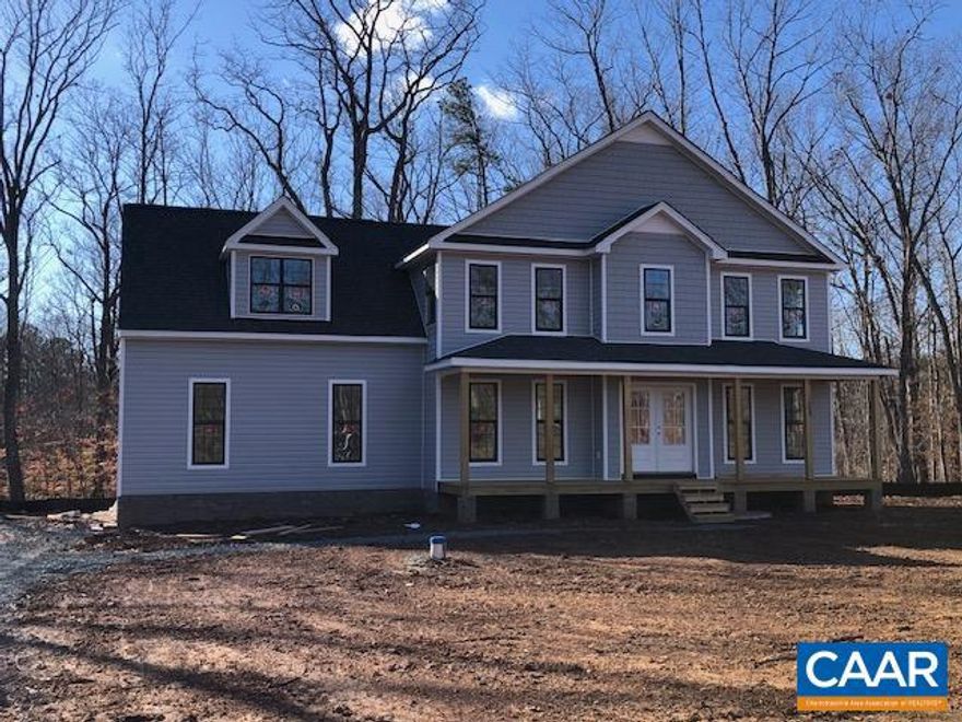 Exterior photo taken 12/19/23. Spring completion is anticipated for the ROSS w/ full length Covered Porch. Additional features include Attached Garage, Upgraded Siding Accents, Wide Window Trim, Black Windows on Front, Vinyl Front Porch Rails, Painted French Front Door, Master Suite has Trim Package and 5 ft. Tile Shower w/ Shower Door, Double Vanity, Laminate Floors on 1st level, Oak Stairs w/ Craftsman Rail Package, Open Kitchen, Granite Counters, Island, Stainless Farmhouse Sink, 42" Cabinets, Pantry Cabinet, Stainless Appliances, Extra Windows in GR, 10'x14' Deck, Pull Down Attic Stairs for Storage, and So Much more! Septic System is designed for 3 bedrooms accommodates 6 occupants. Interior photos are a similar home.