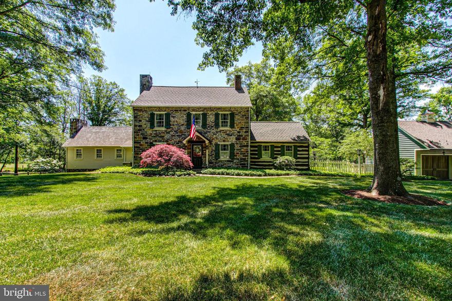Nestled amongst 10.5+ tranquil acres of farmland, this circa 1795 stone Farmhouse located on a quiet county lane in West Rockhill Township offers the pastoral setting that is quintessential Historic Bucks County. 
Upon entrance you will notice this home has been completely restored and upgraded including a spacious country kitchen with hand planed cabinets, blacksmith hardware, farm sink, high-end stainless steel appliances and quartz countertops.  You will fall in love with the recent Post & Beam addition with a wood burning stone fireplace, underfloor radiant heating and a walkout basement that is finished which could easily serve as an in-law or au pair suite. 
This stone relic has been lovingly cared for and features a security system, interior stone pointed walls, beamed ceilings, deep window sills, butterfly circular stairs, random width oak planked floors on the first level and pumpkin pine floors on the second level that lead to a finished attic.  Other features include a second wood burning fireplace in the original portion, two gas log stoves, central vac, central air, 4 bed rooms, 3.5 bathrooms, and an office. Absolute perfection down to the last detail.
Outdoor amenities include an authentic British phone box, hot tub, fenced yard, two field stone terraces, 2 car garage with loft, Pennsylvania German bank barn, 2 paddocks, and three fenced pastures w a seasonal stream.
Become the 22nd owner (if only walls could talk) of this historically significant home and experience old world charm at its finest! Minutes from a restaurants, Level ll Trauma Center, and local Regional Police Headquarters. Schedule your showing today!