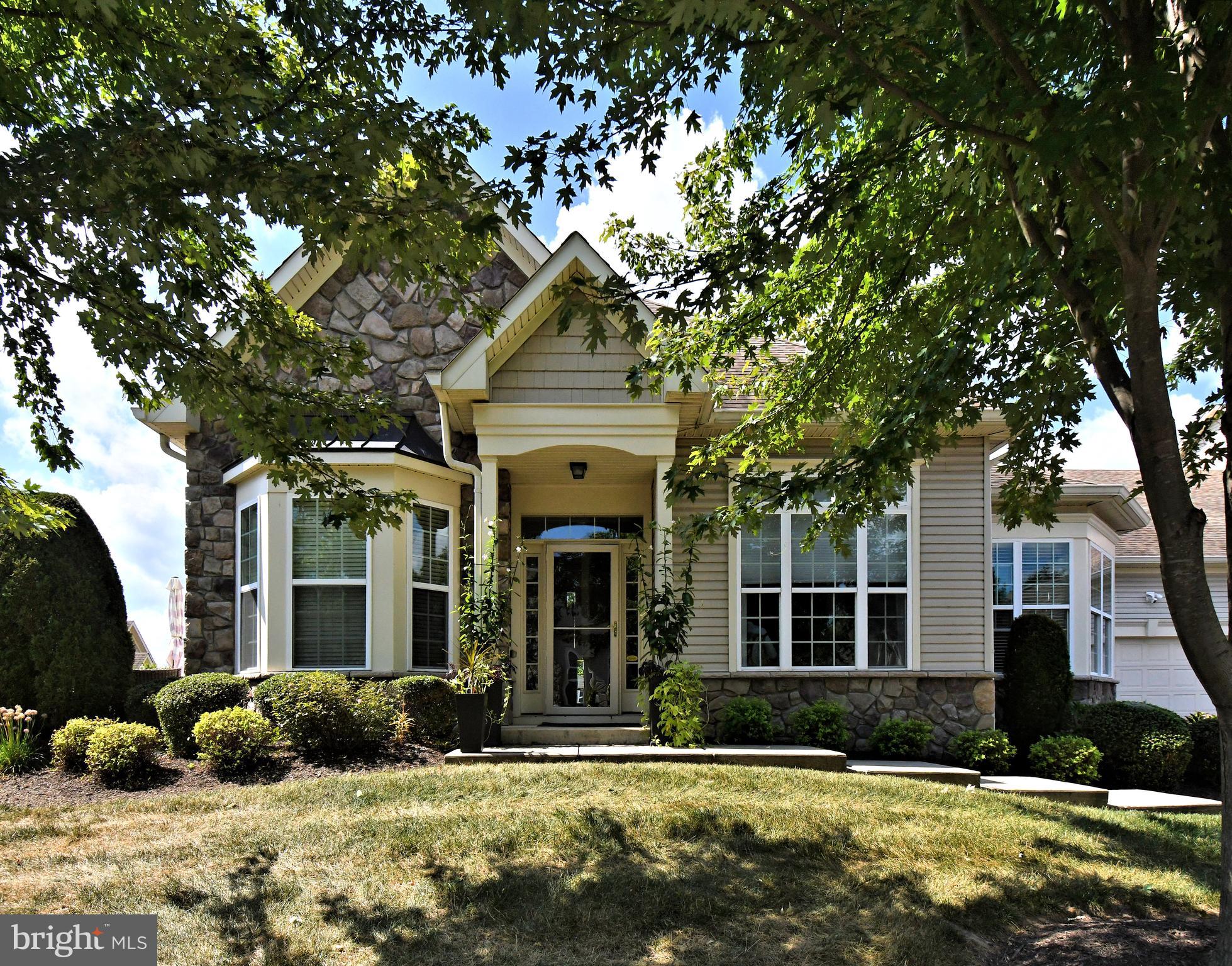 Absolutely stunning, completely remodeled with every conceivable modern amenity!
Truly one of a kind in the highly desirable location at The Villas of Newtown. Enter a modified foyer onto wide plank red oak flooring throughout the entirety of the home. Designer Cathedral ceilings accented with custom lighting drapes the formal living and dining rooms. The luxurious gourmet kitchen features marble counters and back-splash, Sub-Zero refrigeration, Wolf range and designer cabinetry all open to the inviting breakfast room. A custom wet bar with leathered marble counters, wine refrigeration, hide away laundry and abundant pantry space opens to both the garage and 2nd level. A sumptuous master bedroom room with custom color scheme and lighting includes two walk-in closets, a redesigned spa-like master bath with jetted tub, commode with bidet, and roman shower. Bedroom two and a gorgeous second bathroom with wall to wall custom tiles, seamless accessible shower, "Toto" commode and floating designer sink complete the main level. Upstairs features all hardwood flooring including staircase, custom glass banister showcasing the lounging area, bedroom three and full bathroom, a yoga room and private study. Nothing left unattended, the full two bay garage was finished with beautiful epoxy flooring and sub walls and custom shelving for additional storage. Better than new construction with minimal property taxes makes this home unique for the educated consumer!