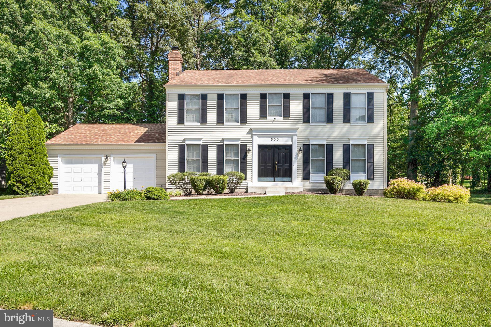 Fabulous Price for this Impeccably Maintained 2-Story Colonial in "Extremely" Sought After Shipley's Choice. Inviting Double Door Entry leads to the Open Two Story Foyer with Landing Staircase and Hardwood Flooring. Main Level has Nicely Sized Formal Living and Dining Rooms with Chair Rail and Crown Moulding. Spacious 1st Floor Family Room features a Cozy Wood Burning Masonry Fireplace with Brick Surround and Freshly Painted Mantel - All Set for your Flat Screen above. Beautifully Updated Custom "Bray & Scarff" Designed and Installed Kitchen Boasts Light Cherry Cabinetry w/Crown Moulding, Stainless GE Profile Appliances, and Quartz Countertops. Upper Level has Large Primary Bedroom w/En-Suite Full Bath that features a Make-Up Vanity, Dual Sinks and Soaking Tub w/Natural Light Above via a Well Placed Skylight. On the Upper Level you will also find (3) Additional Bedrooms (one has an attached catwalk to the primary) and a Full Hall Bath. Lower Level is Very Spacious and Recently Freshly Painted and Newly Carpeted - A great Area for All to Enjoy (has an ingress/egress Window too). Entire Home Recently Painted and Brand New Neutral Carpet was Installed Thru-Out. Most Windows have Custom Plantation Shutters. Huge Deck w/Composite Floor Boards overlooks Level Private Corner Lot w/Mature Trees. Architectural Shingled Roof and Attached 2-Car Garage w/Auto Openers. TRANE HVAC w/Electronic Filter. FANTASTIC Community Amenities Include: Community Pool, Tot Lot, Tennis Courts, Ball Fields and More! Blue Ribbon School District! THIS ONE WON'T LAST! Feel Free to Call Listing Broker if you have any Questions!