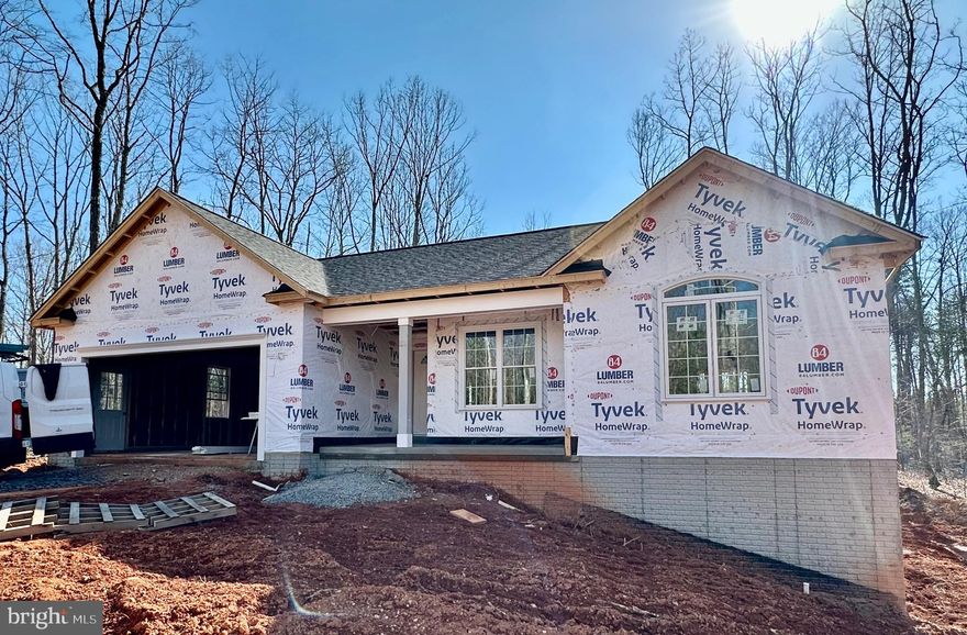 UNDER CONSTRUCTION! CHARLESTON II MODEL - LOT 1- Located on a lovely 2.97 acre mostly wooded lot. Home will include an open floor plan with Stainless Steel Appliances and Granite Counter Tops in kitchen, Cultured marble vanity tops in the bathrooms, Covered front porch, Unfinished Basement with bathroom rough-in for future expansion and a 2 car garage. Call for more information or to schedule a showing! Road Maintenance Agreement.