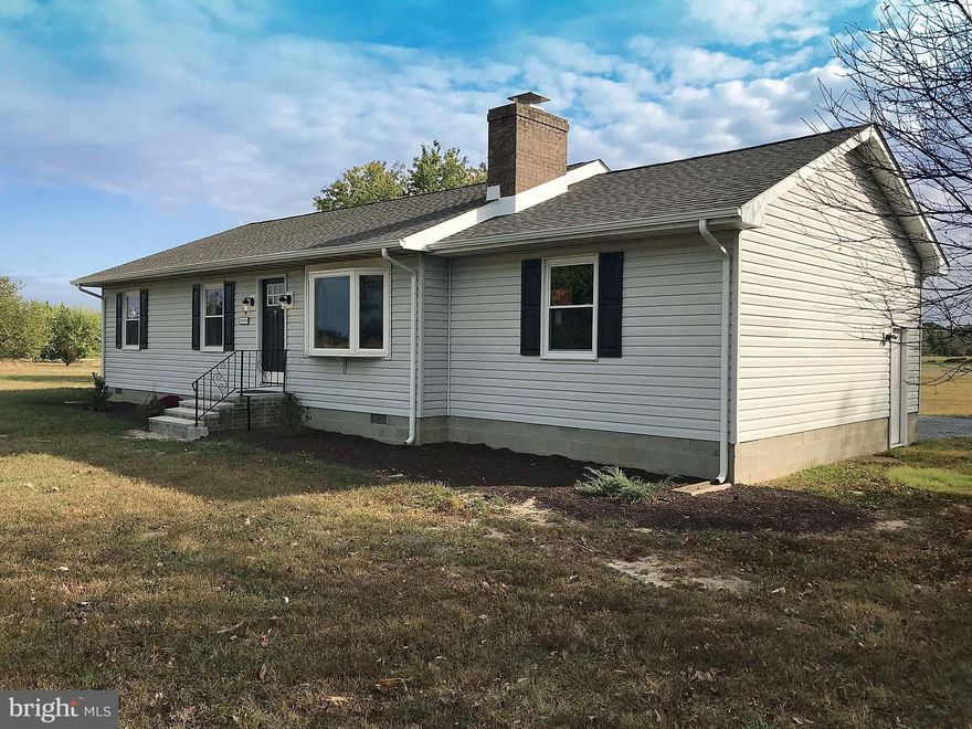 This 3 bed 2 bath home has been completely & meticulously redone top to bottom! Sitting on 2 acres surrounded by expansive farmland views! New HVAC, New Roof, New flooring, New Decking, New kitchen, New Bathrooms, New paint, New Fixtures, New EVERYTHING! HUGE stand up attic ful llength of the house. Oversized 1 car garage with vaulted ceilings perfect for overhead storage!