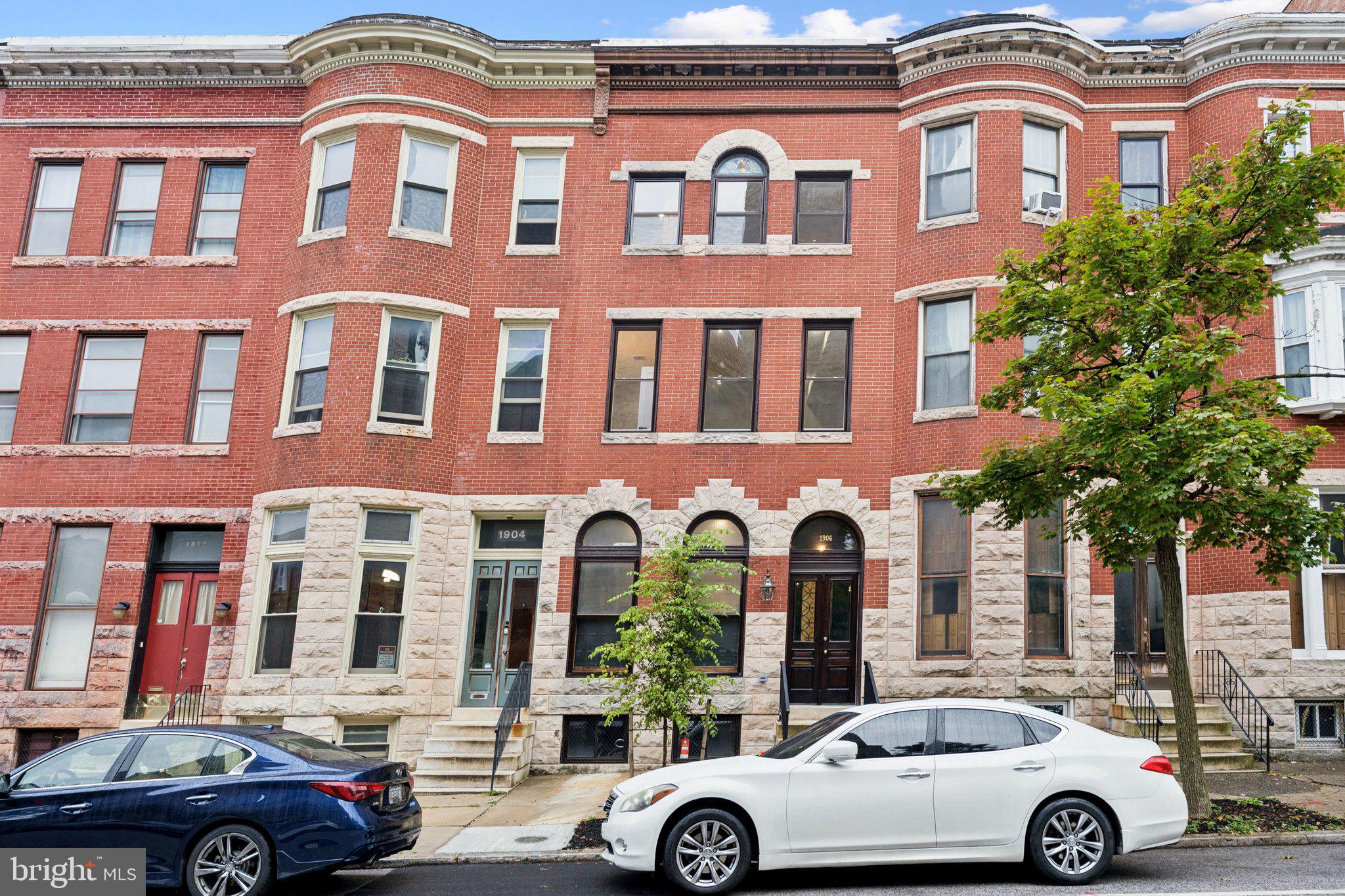Discover refined city living in this fully renovated 4 level townhome in historic Madison Park. This thoughfully designed home features hardwood floors throughout, statement walls with wainscoting, formal dining room, and a stunning 10' kitchen island. 4 spacious bedrooms all have a private bath and walk in closets. The primary bedroom offers a separate soaking tub and shower. ALL NEW: HVAC, electric, plumbing, drywall, wood floors, and ceramic tile. Enjoy a new deck, privacy fence, and parking pad for 2 large vehicles. The perfect blend of historic charm and modern luxury.