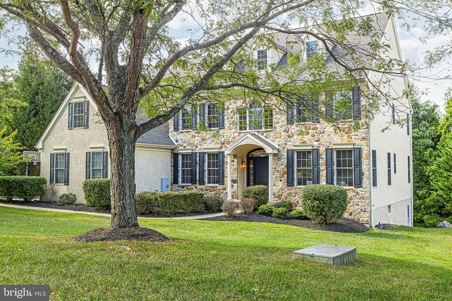 Welcome to 9 West Branch Lane, a Brinton Model Custom Built Home in the Prestigious Cherry Creek Conservation Community. Tucked away on a premium lot, this stunning 5 bedroom, 4.5-bath Brinton Model home offers the perfect blend of luxury, comfort, and timeless design. Located in the highly coveted Cherry Creek Conservation Community, this residence impresses from the moment you arrive, with real Pennsylvania Brown Field stone and a stately exterior that sets the tone for what awaits inside. Step through the sunlit two-story foyer and take in the elegant ambiance. To your right, a gracious formal living room invites conversation and music, while to your left, a classic dining room sets the stage for unforgettable dinners. Just off the foyer, a private office or study offers the ideal work-from-home retreat.
Designed for both entertaining and everyday living, the heart of the home is the chef’s kitchen, featuring rich cherry Century cabinetry, granite countertops, a center island, and top-tier stainless appliances including a 5-burner gas cooktop, double ovens, and a built-in butler’s pantry. The adjacent breakfast room opens to a spacious expanded composite deck, perfect for dining al fresco and enjoying views of the natural woods just behind the home—your own private sanctuary. The kitchen flows seamlessly through the morning room and into the family room, with a vaulted ceiling, bathed in natural light and anchored by arched windows, a gas fireplace with real a custom wood mantle and slate surround. A powder room, laundry and mudroom and side entrance 3-car garage access round out the main level. Take either the grand staircase or the convenient rear butterfly stairs to the second floor, where the luxurious primary suite awaits. Enjoy your private sitting area, dual walk-in closets, and a fabulous spa-style bath with a soaking tub, huge double vanity, and tiled walk-in shower. Four additional spacious bedrooms with ample closet space including two sharing a jack and jill bath as well as a third full hall access bath complete the upper level. Downstairs, the finished walk-out basement adds tremendous versatility with a massive  and sprawling entertainment area perfect for movie nights, game days, hosting guests or working out. A fourth full bath provides convenience and full size windows framing a gas fireplace create a calming, resort-like atmosphere. An off-set sliding door provides access to what could be a beautiful future patio and the sprawling rear yard. Additional highlights include a Three-zone HVAC systems, both units replaced in 2020 time frame for maximum energy efficiency and year-round comfort. Living in Cherry Creek means enjoying over 80 acres of protected open space, scenic walking trails, natural wetlands, and a vibrant sense of community. Located in the heart of the historic Brandywine Valley, you're just minutes from charming downtown West Chester Borough, Kennett Square, parks, and cultural attractions as well as incredible restaurants and upscale shopping. Commuters will appreciate easy access to Routes 202, 322, 1, and I-95—putting Wilmington, King of Prussia, the Main Line, and Philadelphia International Airport within reach. Enjoy the highly acclaimed West Chester School District, feeding into Bayard Rustin High School, and take advantage of tax-free shopping in nearby Delaware.