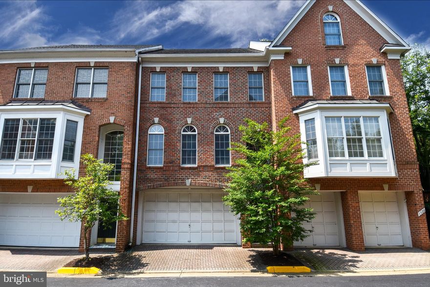 Available for Immediate Occupancy - Stunning 4 level townhome with elevator and fresh new paint throughout! Over 3000 square feet plus a 2-car garage.  Gourmet kitchen includes a cooktop island and upscale appliances.  Hardwood floors on main level.  Vaulted ceilings. 
Finished rec room with gas fireplace and walk out.  Very spacious townhome located in the hear of McLean.