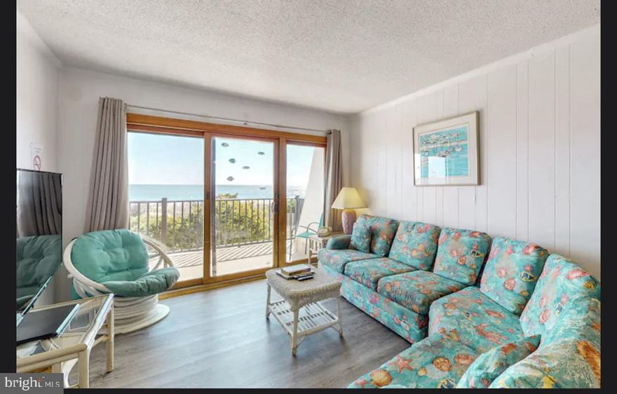 Oceanfront Condo w/ Gorgeous View & Deck Overlooking the Beach . Direct Beach access. Fully furnished Large 2 Bedroom ,2 Bath -Featuring new vinyl plank flooring, updated bath, new HVAC, covered parking space, ocean view.  Sleeps 8-10.
Only the dunes separate you from the open, sandy beach at Sails I 105, an oceanfront condo with a prime location on the north side of Ocean City. Enjoy a spacious, shaded balcony overlooking the beach and ocean, a fully appointed kitchen, and an open living space decorated in charming country furnishings.
Not only will you have the beach waiting right downstairs, you'll be close to fantastic  dining, shopping, entertainment, and nightlife in North Ocean City. All sorts of popular eateries - from Dumser's Dairyland to The Fractured Prune - line Coastal Highway, and beautiful Northside Park is only half a mile north.