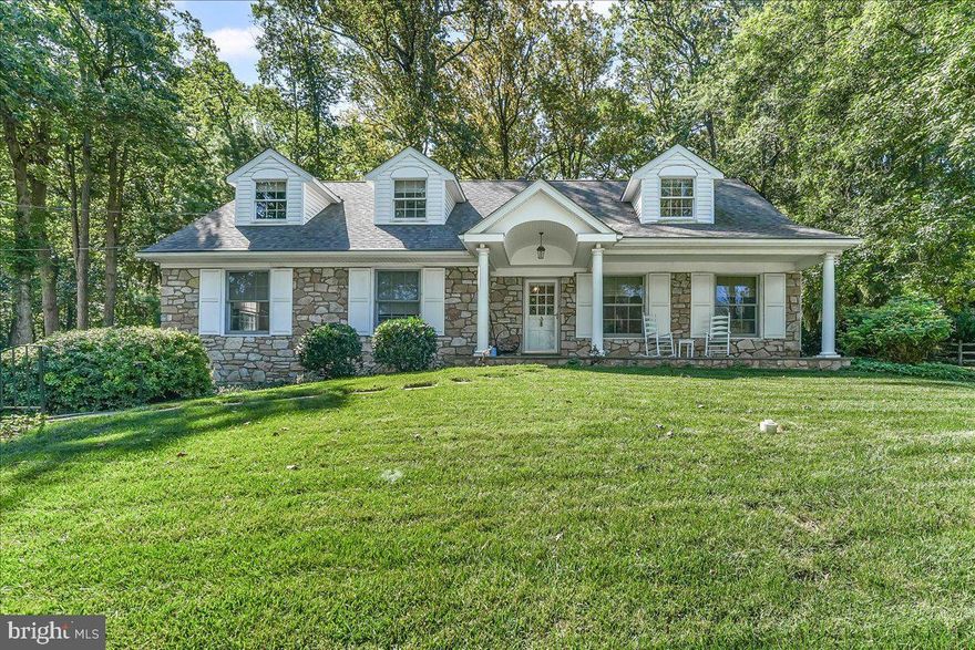 Welcome to this charming and spacious 5-bedroom Cape Cod-style home nestled in one of Wayne’s most sought-after areas. The inviting living room features a cozy gas fireplace and flows seamlessly into the dining area—perfect for entertaining or everyday living. The bright and functional kitchen boasts a Sub-Zero refrigerator, ample counter space, and room to inspire your inner chef. The kitchen and adjacent family room provide direct access to a flagstone patio and a generous, private backyard—ideal for relaxing, gardening, or hosting outdoor gatherings. Three bedrooms are conveniently located on the main level, offering flexibility to suit your lifestyle—use one as a nursery, home office, or even a walk-in closet or dressing room.
Upstairs, you’ll find two large bedrooms and a spacious full bathroom, providing a comfortable retreat for family or guests. This home has a whole house generator, 2 zone HVAC and extensive closet space. With timeless charm, versatile living space, and an unbeatable location, this home offers the perfect blend of comfort, style, and convenience.