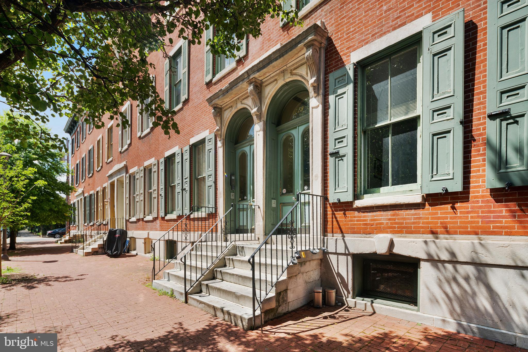 Welcome to 1729 Wallace St!! When one talks of location... this is IT!!  Need parking??? TWO DEEDED parking spots!! Want outdoor space?? TWO beautiful patios!! This unit has it ALL!! Also, updated kitchen with NEW cabinets and NEW granite, two newly updated bathrooms, hardwood floors throughout the ENTIRE unit.   Gracious double doors lead you into the main floor and you can't help but notice the glistening newly refinished hardwood floors.  The striking mantle is the focal point of the room that are opposite floor the ceiling windows.  The NEW white kitchen cabinets and gorgeous granite counter tops finish the room.  Off of the kitchen you step outside to your private fenced patio!  Through the gates you have direct access to YOUR OWN TWO parking spots!! Downstairs you will find two en-suites.  The master comes complete with its own HUGE outdoor living space with brick walls and a plethora of space to plant all of your gardens, perennials and annuals!!   Finding something like this with TWO outdoor space AND TWO parking spaces is VERY hard to come by!!   This is stunning!