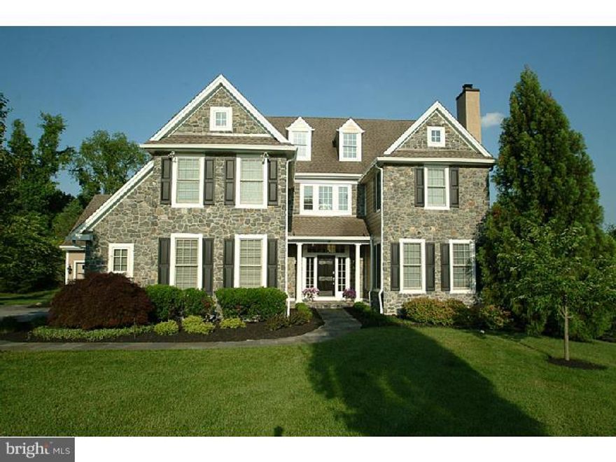 Largest model in the highly desirable community of Fetters Mill.  Located on landscaped lot at the end of cul de sac with stone patio backing to open space and large side yard.  Well maintained and updated over the years by original owners including complete exterior renovation in 2013 replacing original stucco exterior with new stone facade and Hardi-plank siding, new gutters and downspouts and new stucco chimney.  Exterior lighting, stone walkways and many plantings invite you to take a closer look.  Enter the two story foyer with beautiful hardwood staircase and sparkling lighting, opening to large living room with gas fireplace, library with built-in cabinetry, generously sized dining room, mud room with coat closet (with cubbys), built-in desk, powder room and pantry.  Custom cabinetry and lighting in kitchen is complimented by granite counters, new granite island with farmhouse sink, new drawer style dishwashers and double ovens. Great room with fireplace and sunny morning room complete the cozy heart of this home. Hardwood floors throughout and TEN foot ceilings with high transomed doorways on main level. Second floor includes built in hall desk/computer area and convenient upstairs laundry room.  Master bedroom has attached sitting room, tray ceiling, double walk in closets with custom shelving, marble and tiled master bath with soaking tub, huge shower, double vanity and commode room.  Also on second floor two additional bedrooms with own baths and two bedrooms that share a Jack and Jill bath. Lower level is mostly finished with walk out to yard and has a full bath, room with glass french doors, additional finished separate room and large finished area. Several storage areas. Easily customized to suit your lifestyle! Double garage and separate one car garage with openers and new doors. Great location near new turnpike entrance, corporate centers and shopping in the well regarded Great Valley School District.